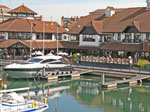 Photo across Port Solent Marina showing the O Sole Mio restaurant on the Boardwalk.